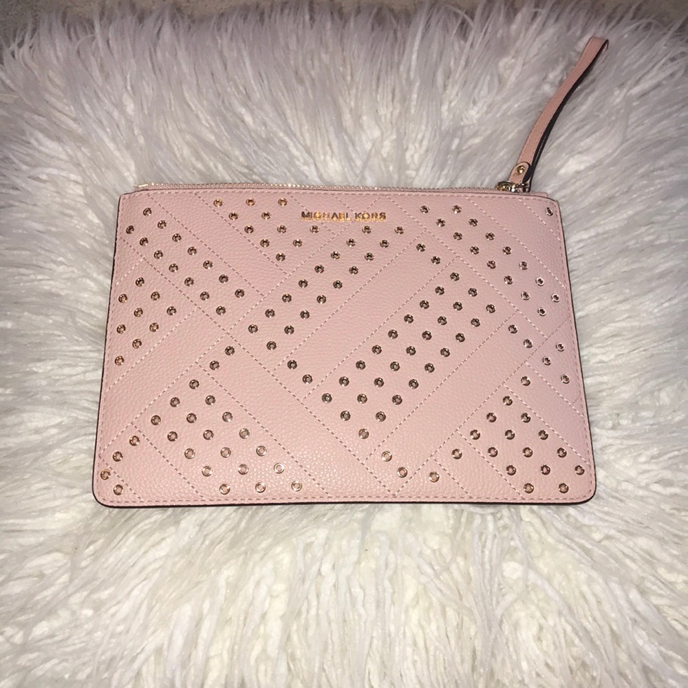 Michael kors clutch. New with no tags.